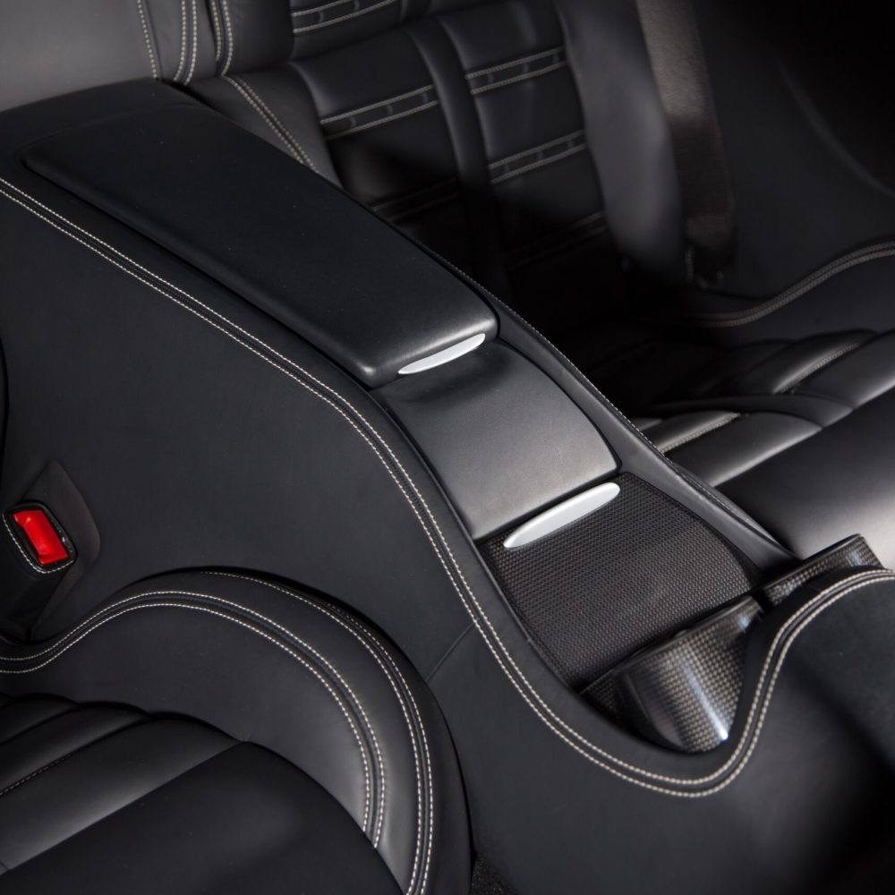 A high angle shot of a black car's modern interior - perfect for background